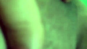 alone at home, she indulges in some private masturbation with her shaved pussy