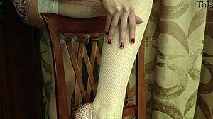 Redhead Cutie In White Stockings Strips Her Clothes