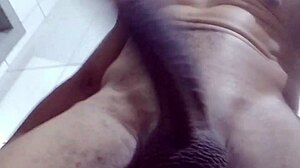 Have you seen this muscular black bodybuilder ripping clothes in homemade striptease?