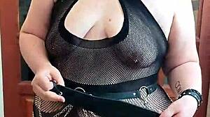 Who is this goth domina in the scene?