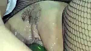 Latina milf shoves cucumber deep for wild squirting pleasure.