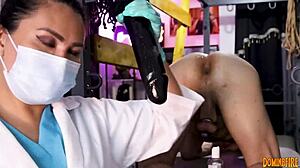 dominafire leads medical femdom anal training in latex at hospital. she’s strict with her patient slave during the exam.