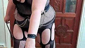 Who is this goth domina in the scene?