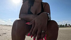 Brunette Slut Cums on Public Beach Under the Sun!