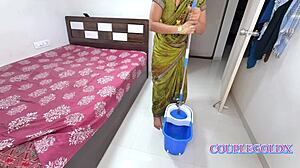 komol's husband sneaks up on the cleaner and fucks her wet pussy from behind