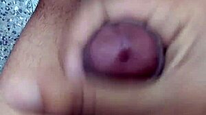 This Indian boy is masturbating his cock.