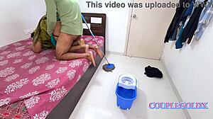 komol's husband sneaks up on the cleaner and fucks her wet pussy from behind