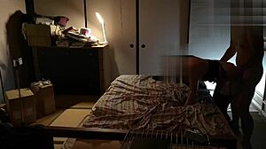 asian girl in stockings gives handjob from behind