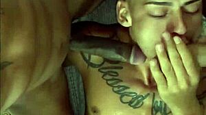 Two well-endowed men fucking the pretty twink in a fetish session