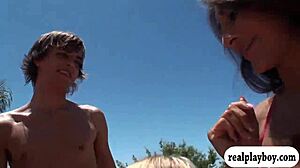 Look at these sexy babes in bikinis having group sex outdoors.