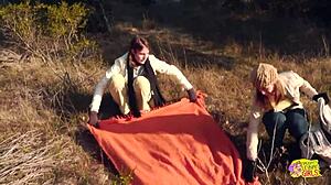 Two brunettes are having wild lesbian sex with a strapon on a hike 😍