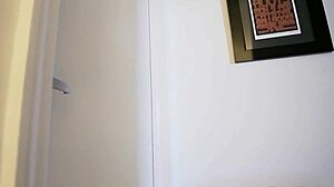 Milf Sara Jay plays with big tits during steamy telephone sex session