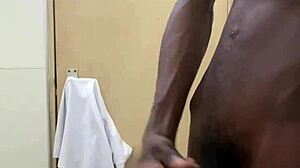 a guy busts a nut in public bathroom with huge black cock