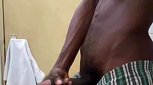 a guy busts a nut in public bathroom with huge black cock