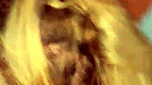 Mature blonde engages in deepthroat with big black cock