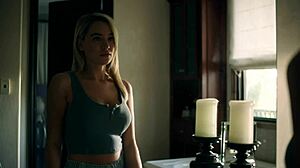 Blake Blossom makes Angel Young suck her tits in bedroom.