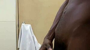 a guy busts a nut in public bathroom with huge black cock