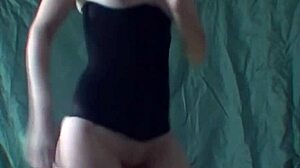 Blonde shows her tits and bush as she dances