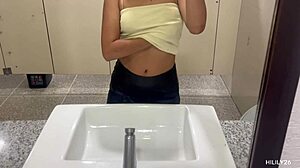 fingering her panties under miniskirt in public park