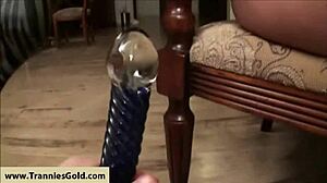 Busty transsexual takes anal in heels with toys
