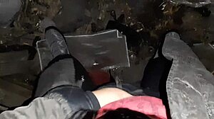 Village girl relaxes in a cold barn