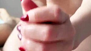 Amateur couple shares intimate handjob with big cumshot