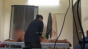 a guy flashes his cock to a spa girl during an ass massage