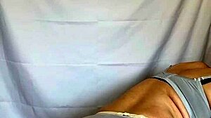 Japanese Babe in Sailor Uniform Teases with Buttplug