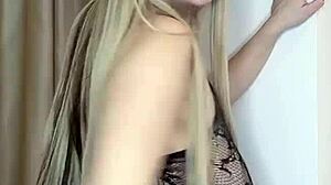 Milf with big natural tits in transparent clothes caresses herself