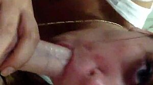 Girlfriend eagerly sucks boyfriend's cock as friend joins in.