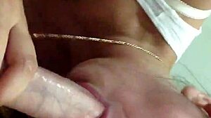 Girlfriend eagerly sucks boyfriend's cock as friend joins in.