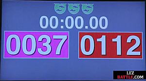 Curvy lesbian in bikini toys loser with vibrator after battle