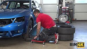 Rim4k Dame with Big Boobs Is Licking Anus in the Car Repair Shop