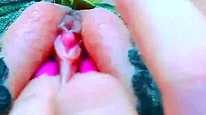 Latina teen fingers her shaved wet pussy with dildo