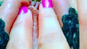 Latina teen fingers her shaved wet pussy with dildo