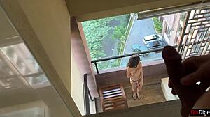 Horny Katty West masturbates on balcony for peeping pervert