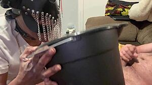 Kneeling whore facefucked drinking puke from bucket