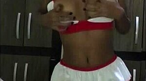 A young Latina nurse cares for her patient in the hospital