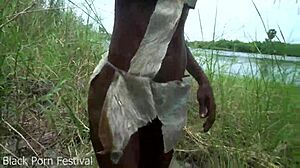 Skinny Ebony Woman Works Outdoor In African Tribe