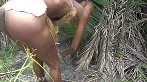 Skinny Ebony Woman Works Outdoor In African Tribe