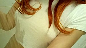 Redhead teen 18+ gets wet and wild in steamy bath