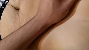 Explore her beautiful natural tits and deep navel in sexy fetish massage!