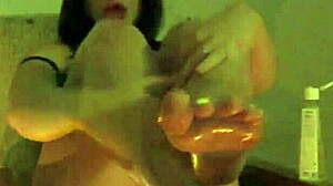 Milf smokes while spanking big ass and masturbating