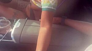 I was playing with his big black cock in the car, giving a sloppy blowjob.