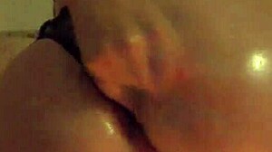 Milf smokes while spanking big ass and masturbating