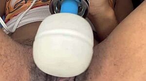 Horny slut edges her ebony hairy pussy with tongue piercing in close-up