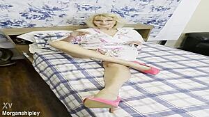 Pretty blonde in pink shows off big natural tits while squirting solo in masturbation