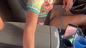 I was playing with his big black cock in the car, giving a sloppy blowjob.