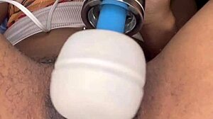 Horny slut edges her ebony hairy pussy with tongue piercing in close-up