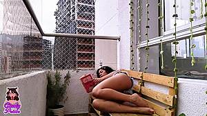 recording on balcony with construction guys